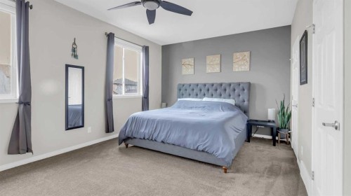 1120 Windhaven Close Sw, Airdrie, AB - Indoor Photo Showing Bedroom