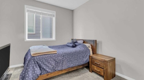 1120 Windhaven Close Sw, Airdrie, AB - Indoor Photo Showing Bedroom