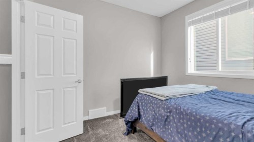 1120 Windhaven Close Sw, Airdrie, AB - Indoor Photo Showing Bedroom