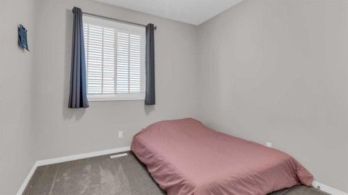 1120 Windhaven Close Sw, Airdrie, AB - Indoor Photo Showing Bedroom