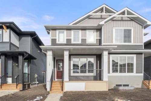 122 Sora Gardens Se, Calgary, AB - Outdoor With Facade