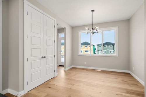 122 Sora Gardens Se, Calgary, AB - Indoor Photo Showing Other Room