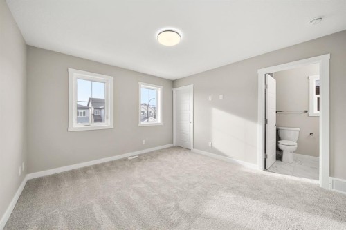 122 Sora Gardens Se, Calgary, AB - Indoor Photo Showing Other Room