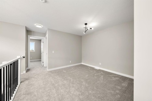 122 Sora Gardens Se, Calgary, AB - Indoor Photo Showing Other Room