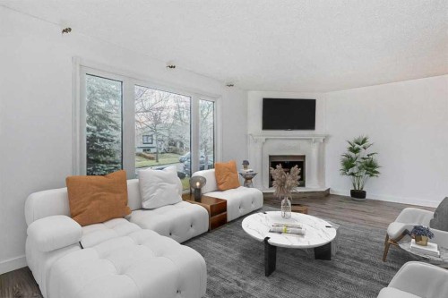 39 Bermuda Drive, Calgary, AB - Indoor Photo Showing Living Room With Fireplace