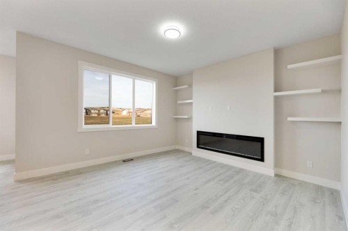 530 Ranch Green, Strathmore, AB - Indoor With Fireplace
