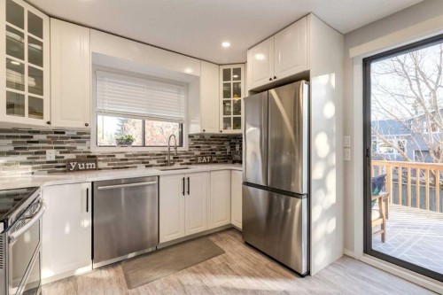 35 Woodstock Road Sw, Calgary, AB - Indoor Photo Showing Kitchen With Stainless Steel Kitchen With Upgraded Kitchen