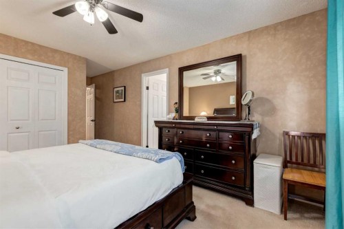35 Woodstock Road Sw, Calgary, AB - Indoor Photo Showing Bedroom