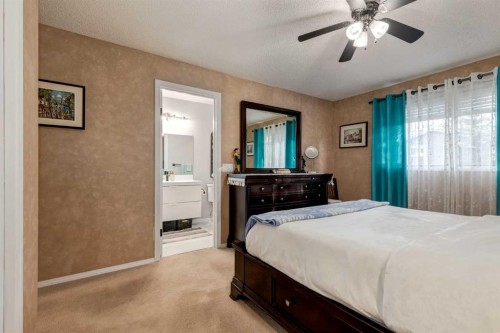35 Woodstock Road Sw, Calgary, AB - Indoor Photo Showing Bedroom