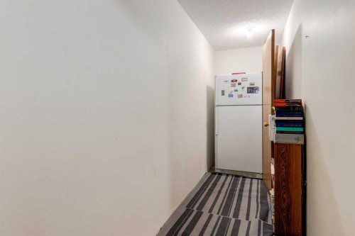 35 Woodstock Road Sw, Calgary, AB - Indoor Photo Showing Other Room