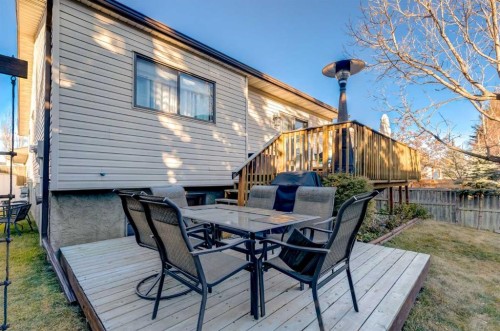 35 Woodstock Road Sw, Calgary, AB - Outdoor With Deck Patio Veranda With Exterior