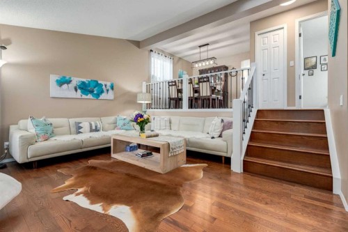 35 Woodstock Road Sw, Calgary, AB - Indoor Photo Showing Living Room