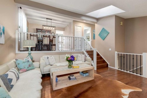 35 Woodstock Road Sw, Calgary, AB - Indoor Photo Showing Living Room