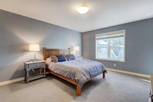 236 Somme Avenue Sw, Calgary, AB - Indoor Photo Showing Bedroom