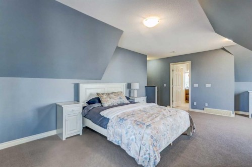 236 Somme Avenue Sw, Calgary, AB - Indoor Photo Showing Bedroom