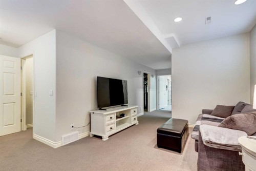 236 Somme Avenue Sw, Calgary, AB - Indoor Photo Showing Living Room