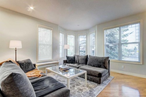 236 Somme Avenue Sw, Calgary, AB - Indoor Photo Showing Living Room