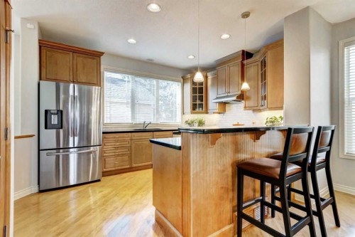236 Somme Avenue Sw, Calgary, AB - Indoor Photo Showing Kitchen With Upgraded Kitchen