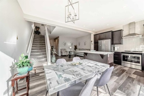 615 Kingsmere Way Se, Airdrie, AB - Indoor Photo Showing Kitchen With Upgraded Kitchen