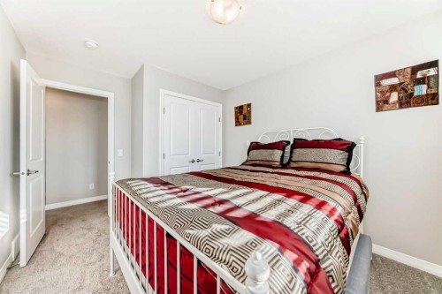 615 Kingsmere Way Se, Airdrie, AB - Indoor Photo Showing Bedroom