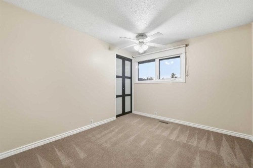 471 Dalmeny Hill Nw, Calgary, AB - Indoor Photo Showing Other Room