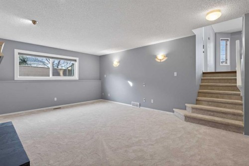 328 Douglas Ridge Close Se, Calgary, AB - Indoor Photo Showing Other Room