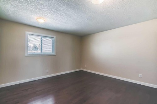 23 Cheltenham Road Nw, Calgary, AB - Indoor Photo Showing Other Room