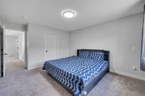 3021 Key Drive Sw, Airdrie, AB - Indoor Photo Showing Bedroom