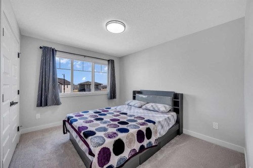 3021 Key Drive Sw, Airdrie, AB - Indoor Photo Showing Bedroom