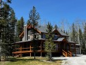 231035 Range Road 54, Bragg Creek, AB  - Outdoor With Facade 