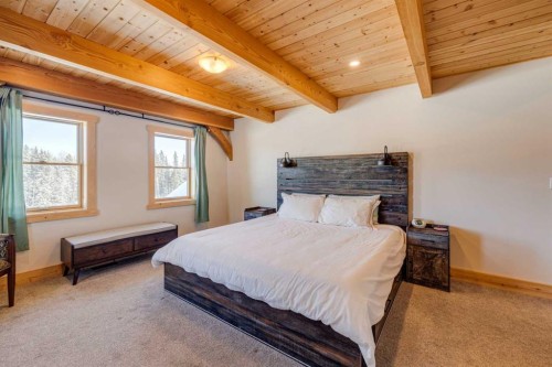 231035 Range Road 54, Bragg Creek, AB - Indoor Photo Showing Bedroom