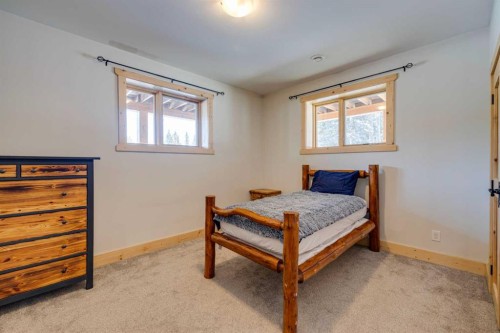 231035 Range Road 54, Bragg Creek, AB - Indoor Photo Showing Bedroom