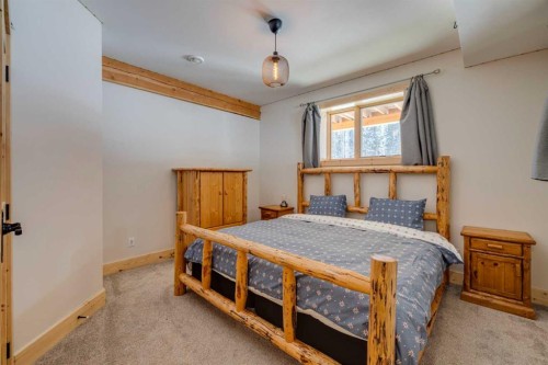 231035 Range Road 54, Bragg Creek, AB - Indoor Photo Showing Bedroom