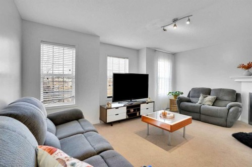 73 Covebrook Place Ne, Calgary, AB - Indoor Photo Showing Living Room