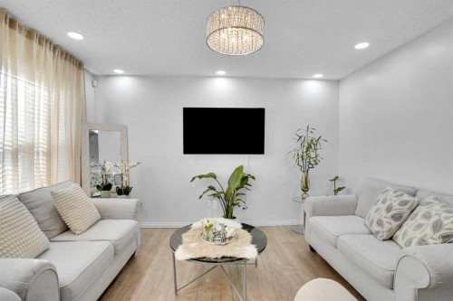 73 Covebrook Place Ne, Calgary, AB - Indoor Photo Showing Living Room