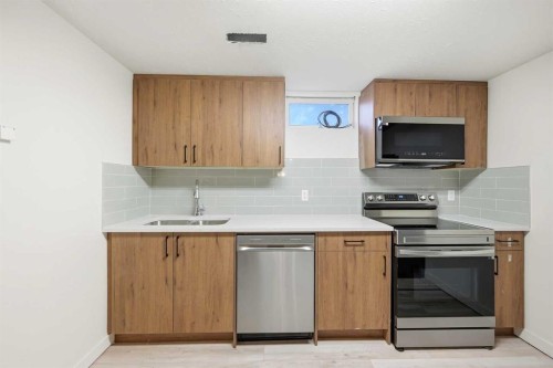 440 Foritana Road Se, Calgary, AB - Indoor Photo Showing Kitchen With Stainless Steel Kitchen With Double Sink