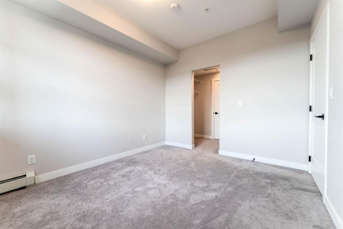 2312-55 Lucas Way Nw, Calgary, AB - Indoor Photo Showing Other Room