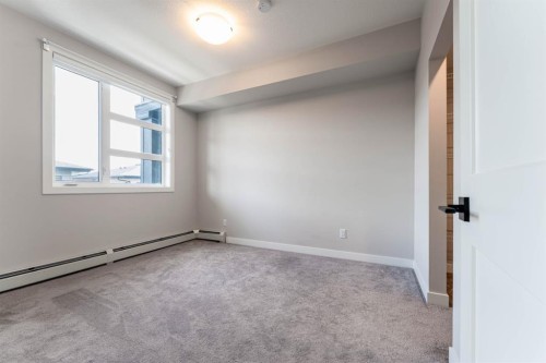 2312-55 Lucas Way Nw, Calgary, AB - Indoor Photo Showing Other Room