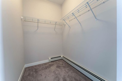 2312-55 Lucas Way Nw, Calgary, AB - Indoor With Storage