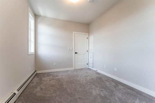 2312-55 Lucas Way Nw, Calgary, AB - Indoor Photo Showing Other Room