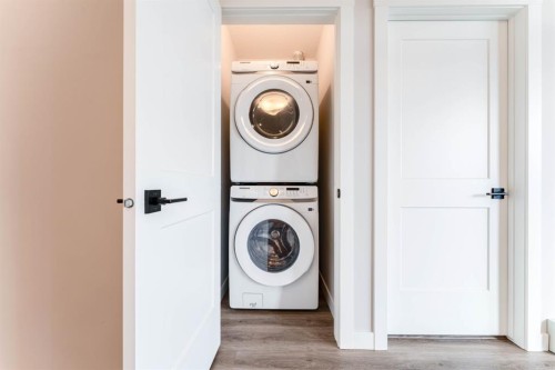 2312-55 Lucas Way Nw, Calgary, AB - Indoor Photo Showing Laundry Room