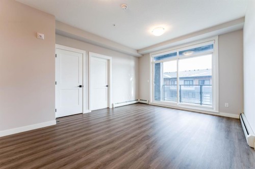 2312-55 Lucas Way Nw, Calgary, AB - Indoor Photo Showing Other Room