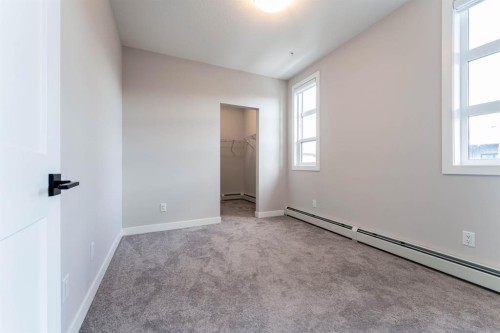 2312-55 Lucas Way Nw, Calgary, AB - Indoor Photo Showing Other Room