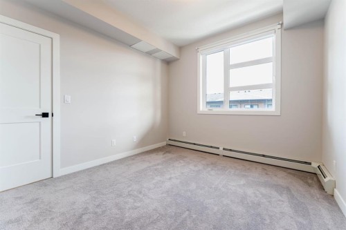 2312-55 Lucas Way Nw, Calgary, AB - Indoor Photo Showing Other Room