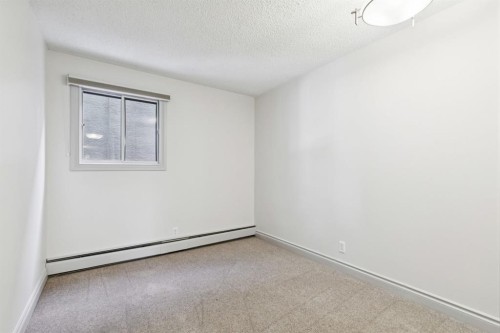 6-1607 26 Avenue Sw, Calgary, AB - Indoor Photo Showing Other Room