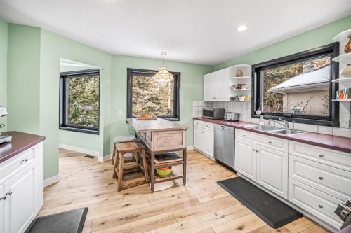 108 Lougheed Circle, Banff, AB - Indoor Photo Showing Kitchen With Double Sink