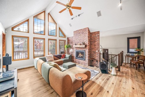 108 Lougheed Circle, Banff, AB - Indoor Photo Showing Other Room With Fireplace