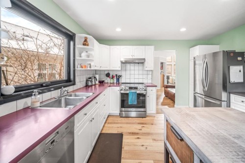 108 Lougheed Circle, Banff, AB - Indoor Photo Showing Kitchen With Double Sink