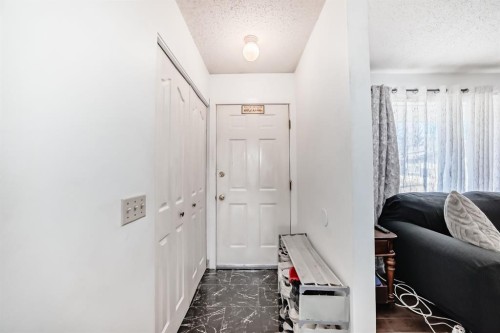19 Malvern Place Ne, Calgary, AB - Indoor Photo Showing Other Room