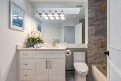 113 Straddock Terrace Sw, Calgary, AB - Indoor Photo Showing Bathroom